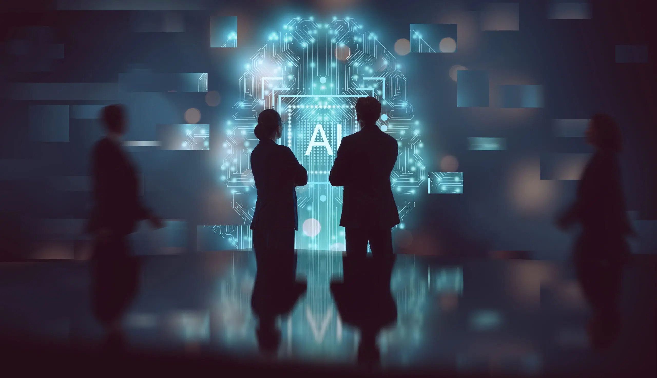 Silhouetted business professionals standing in front of a glowing digital brain and AI interface symbolize the collaboration and forward-thinking mindset essential in modern technology-driven decision making. This atmospheric and futuristic stock photo evokes a sense of curiosity, innovation, and partnership while emphasizing the impact of artificial intelligence in business strategy, digital transformation, and human-machine collaboration.
